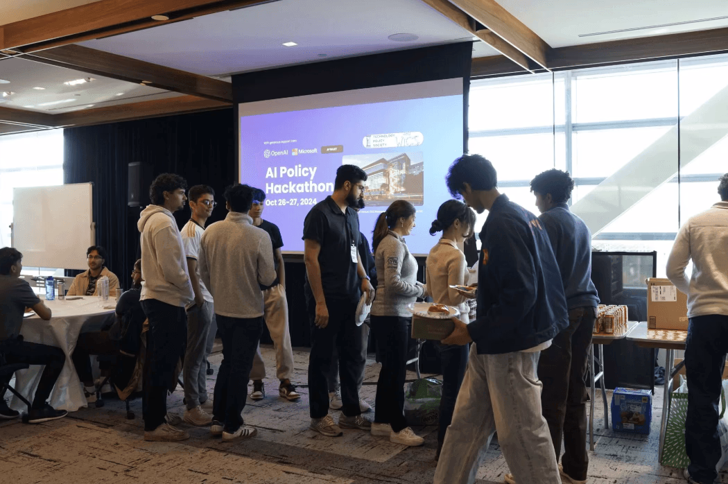 Participants collaborating at the hackathon